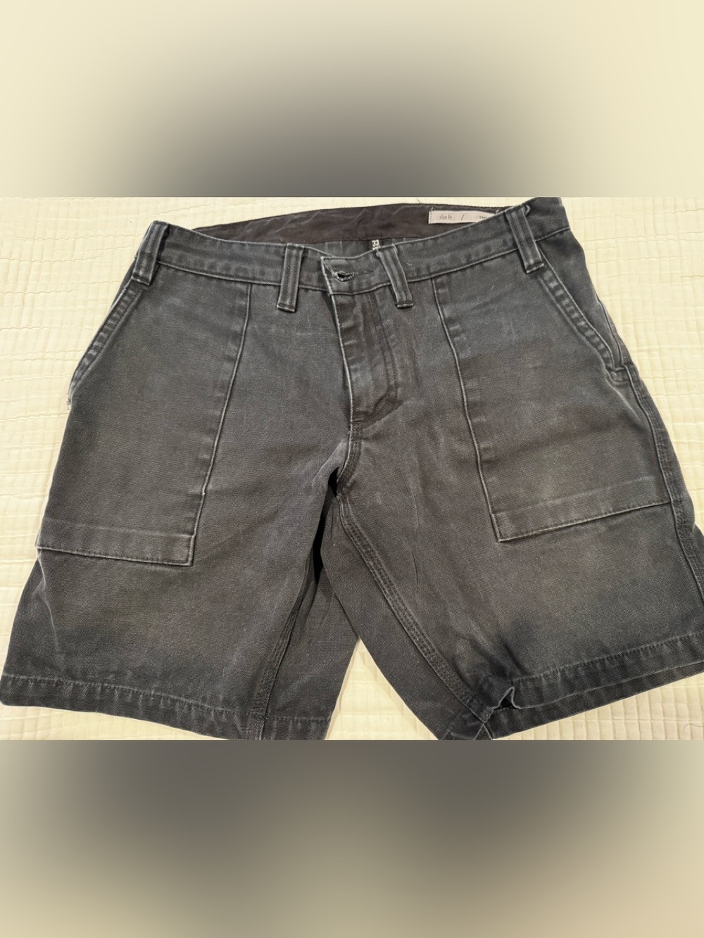 Swrve brand High-Waist Black Denim Skirt with Patch Pocket